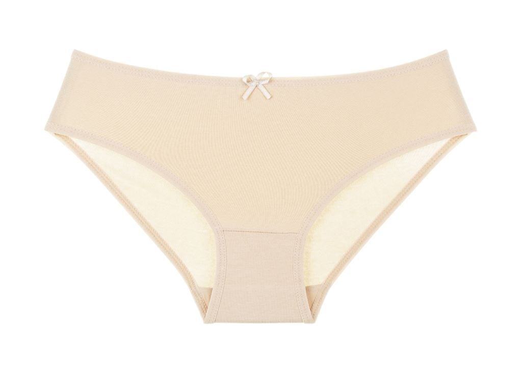 Труси для дівчинки плавками трикотаж однотонні з бантиком бежеві 4171T Donella 10-11рр