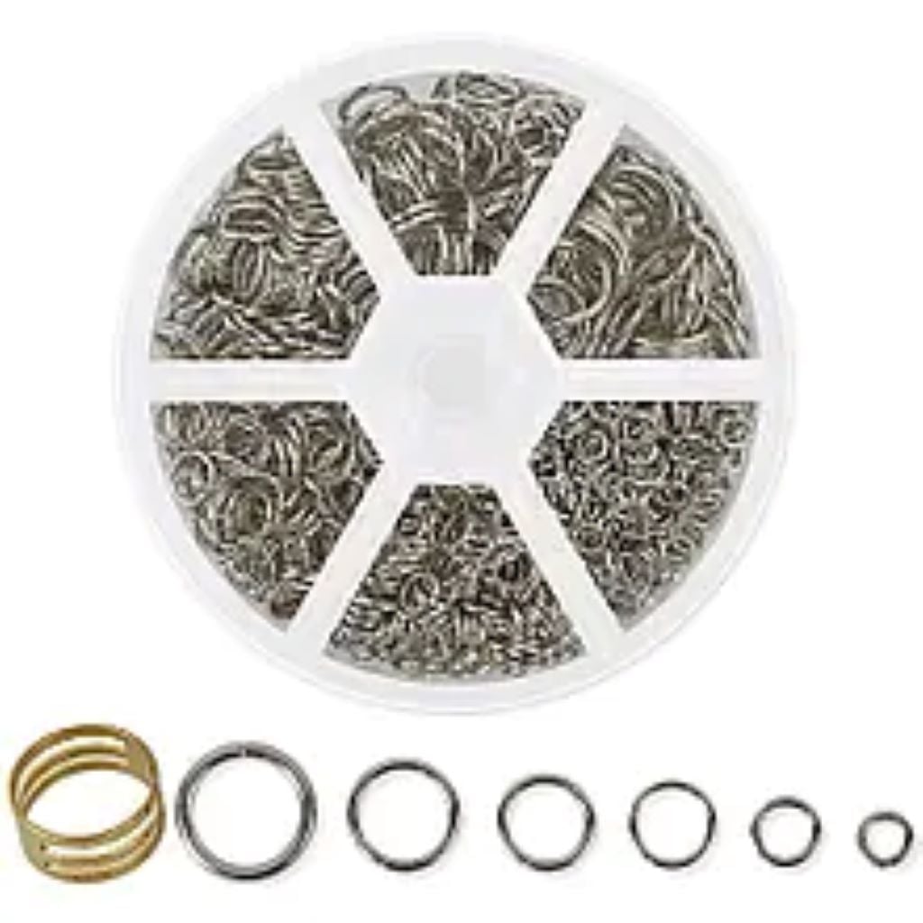 Набір фурнітури кільця срібло 1025шт і контейнер у пакеті 85-66 Україна