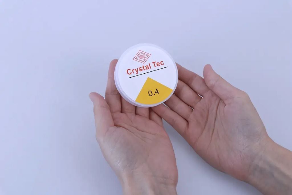 Нитка гумка еластична 0,4мм 20м прозора 24-16 Китай