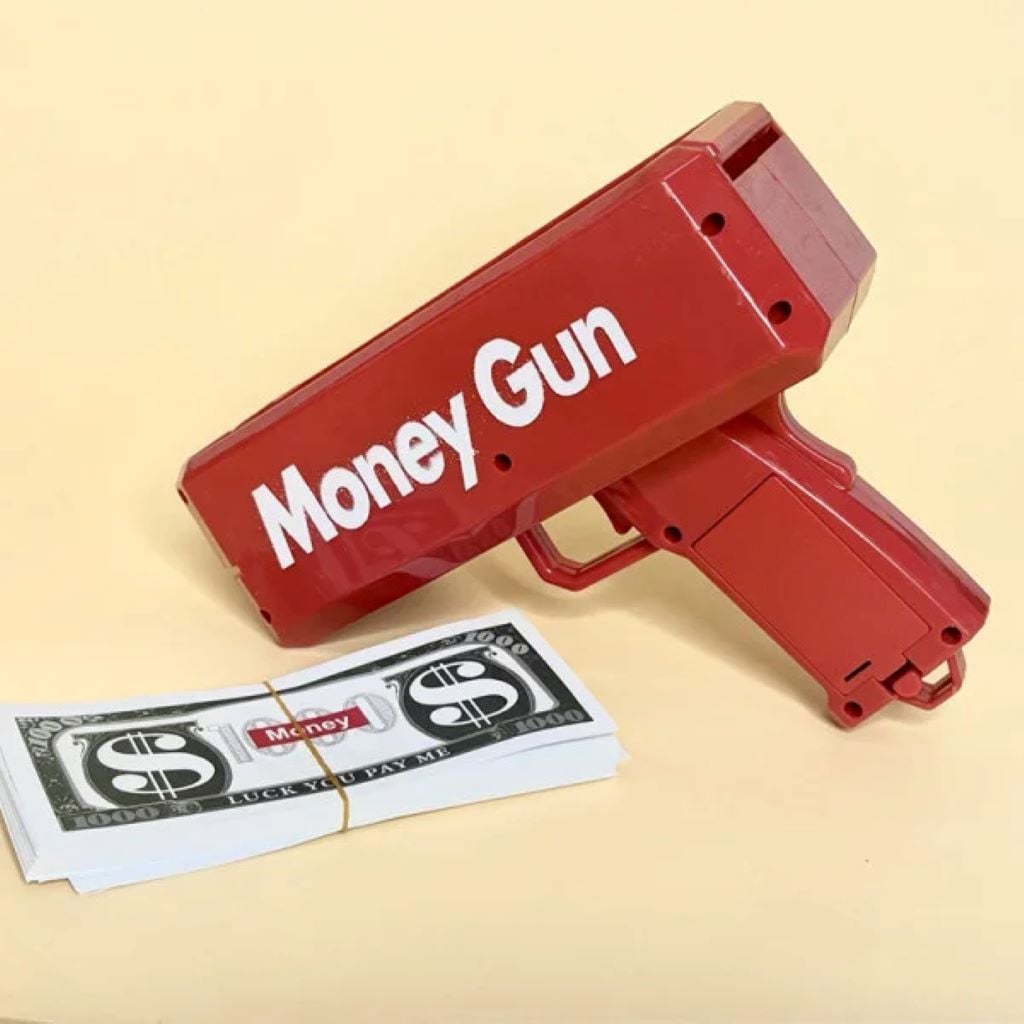 Пістолет грошовий пластик автоматична подача купюр пачка декоротивних купюр у коробці 19*16*8см  N-1421 Китай