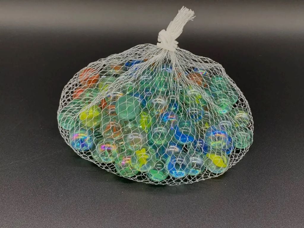 Камінчики прозорі скляні 100г круглі різнокольорові у сітці KM-014 Китай