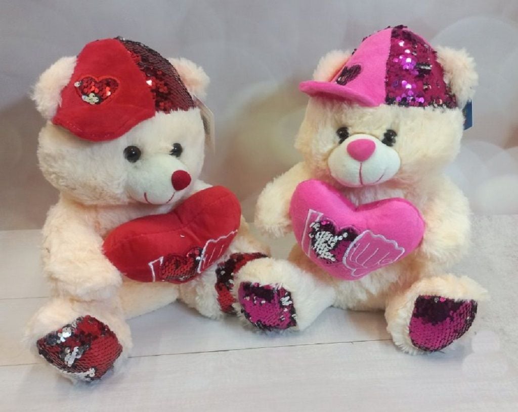 М'яка іграшка Ведмедик 30см у кепці з серцем Love в паєтках музичний, сидить, травка молочний 21017 Сонечко